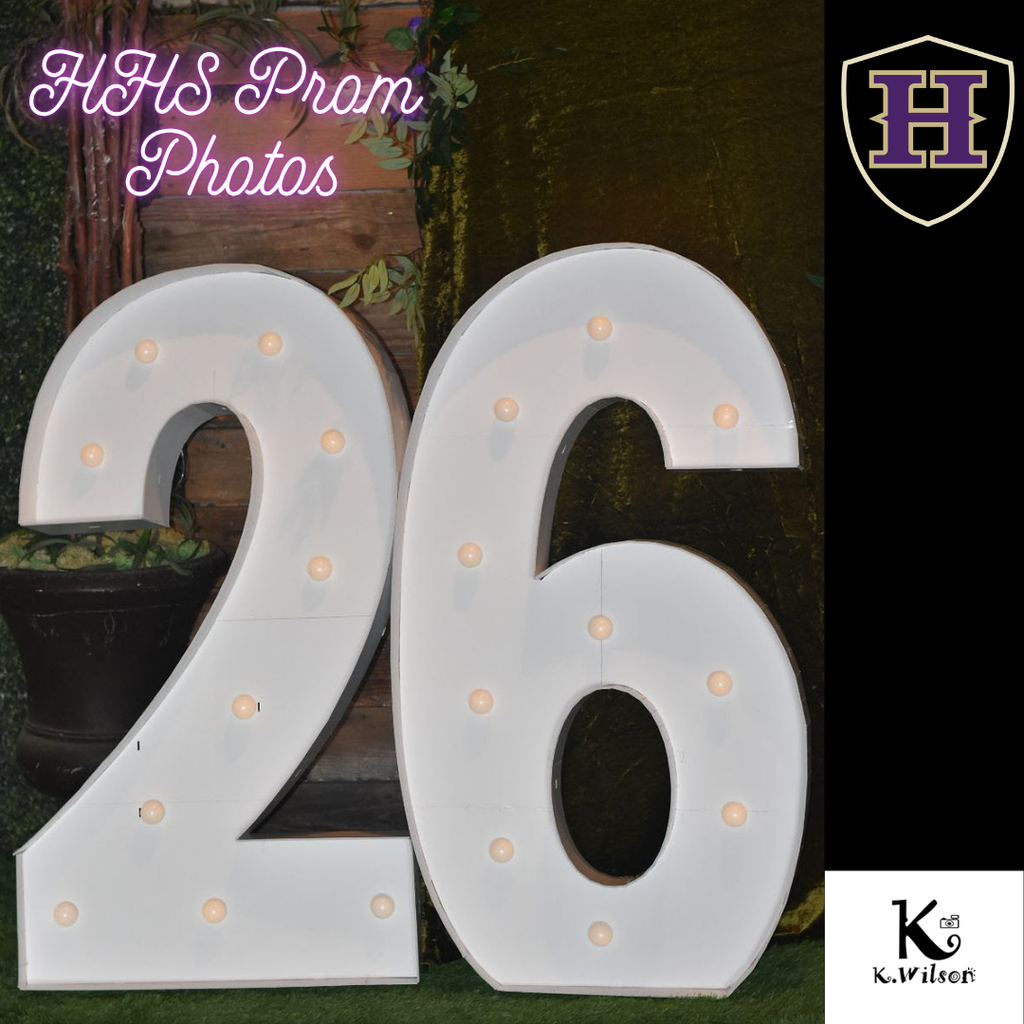 Large white LED numbers "26" with glowing dots, set against a black backdrop with "HHS Prom Photos" text.