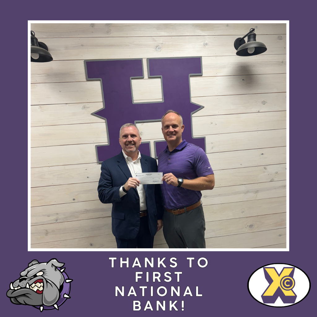  "Thanks to First National Bank!" Stephen McRea presents a check to Coach Barnett to support the HHS Cross Country Team. 