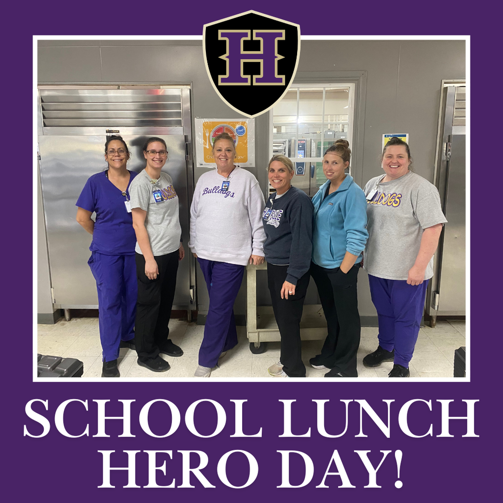 A picture of the lunchroom ladies of HHS. A purple background displays "SCHOOL LUNCH HERO DAY!"