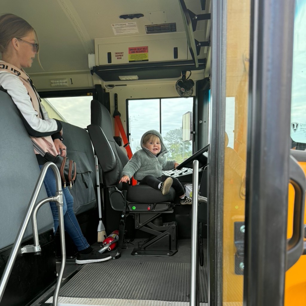 Child in bus seat