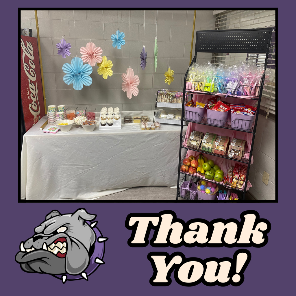 Display of snacks and candies on a table with paper flowers in the background. A purple border and "Thank You!" text.