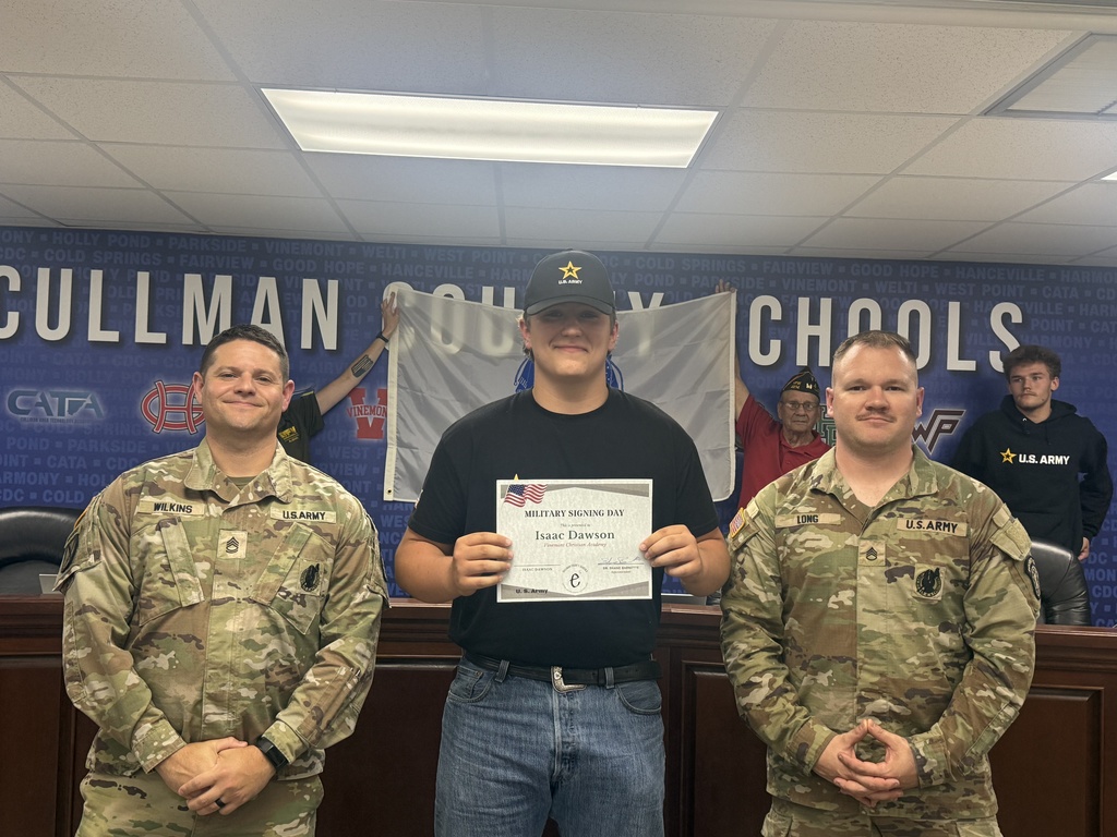 Three men in military uniforms stand in front of a wall with "Cullman County Schools" written on it.