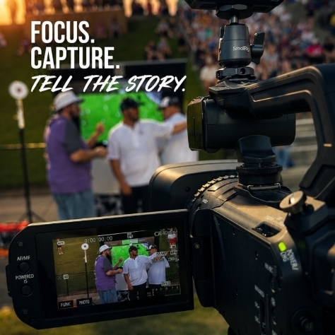A video camera recording people. Background shows a large crowd watching an event. Text reads "focus. capture. tell the story."