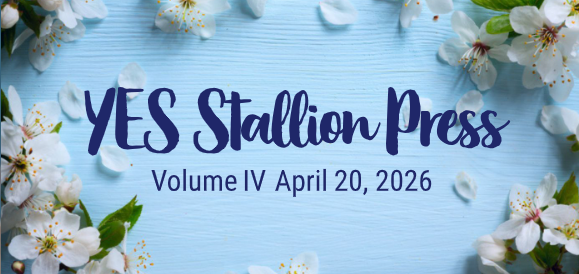 Newsletter cover with a light blue wooden background decorated with white blossoms and scattered petals. Dark blue script text reads 'YES Stallion Press,' with smaller text saying 'Volume IV April 20, 2026.