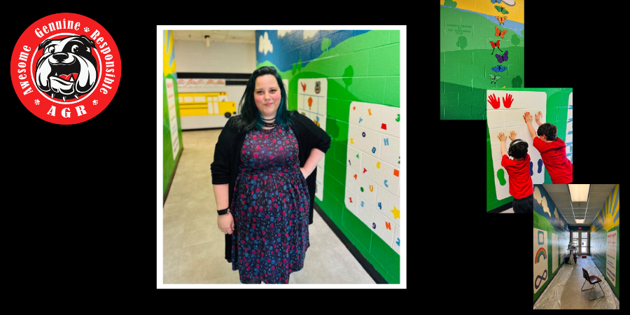 A parent volunteer stands smiling in a brightly painted school hallway featuring a colorful mural with green rolling hills and interactive elements. Smaller inset images show details of the mural, including painted butterflies, a breathing or mindfulness station with handprints where two young students in red shirts are placing their hands on the wall, and a long view of the completed “Reset Road” hallway with calming visuals and prompts. An AGR (A.G. Richardson) bulldog logo appears in the corner.
