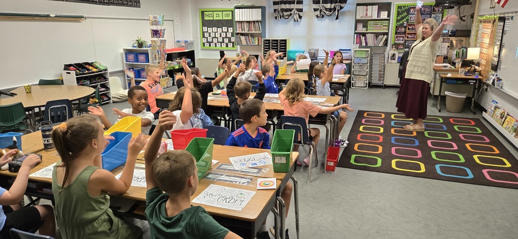3rd grade teacher demonstrating call and response for students