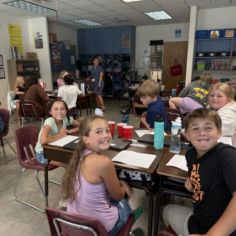 Mrs. Day’s 5th grade class using melting ice to make hypotheses and learn about scientific processes. 