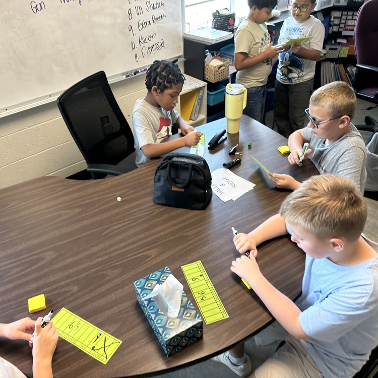Mrs. Birch's fourth graders enjoyed playing place value chance where they had to roll a dice and create the greatest number.