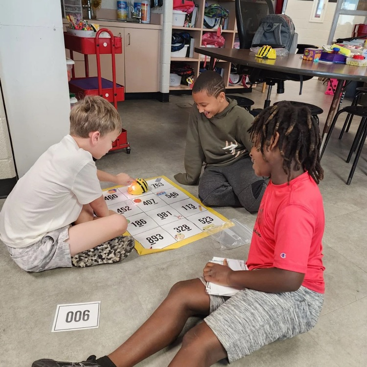 Third graders in Mrs. Sink's class woke the Bee Bots from their summer slumber - they were the first class to use these coding devices.  All the while they were showing their knowledge of place value.