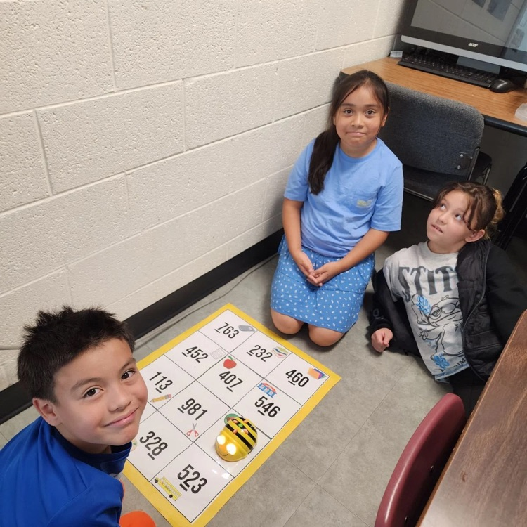 Third graders in Mrs. Sink's class woke the Bee Bots from their summer slumber - they were the first class to use these coding devices.  All the while they were showing their knowledge of place value.