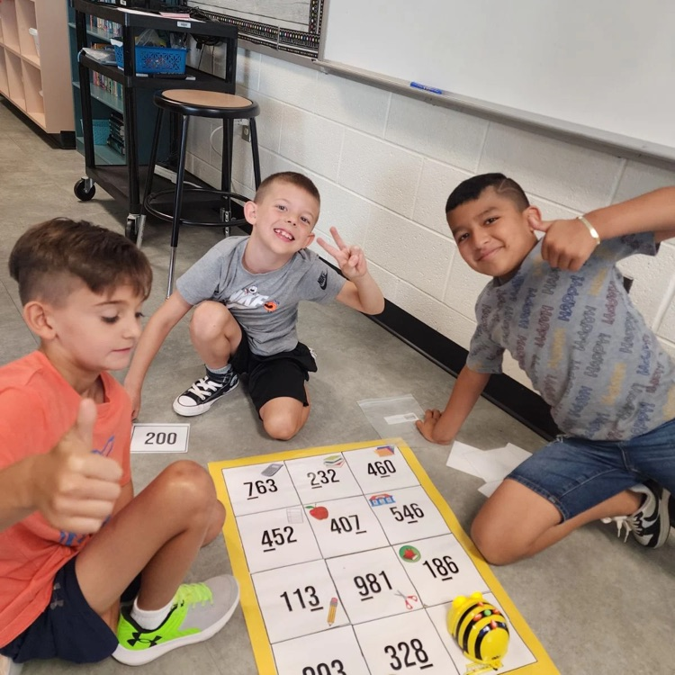 Third graders in Mrs. Sink's class woke the Bee Bots from their summer slumber - they were the first class to use these coding devices.  All the while they were showing their knowledge of place value.