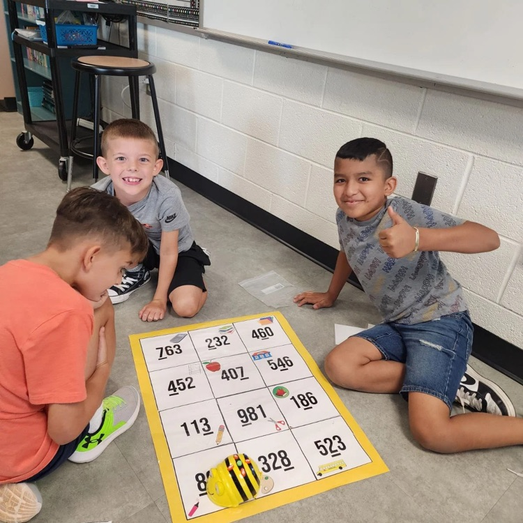 Third graders in Mrs. Sink's class woke the Bee Bots from their summer slumber - they were the first class to use these coding devices.  All the while they were showing their knowledge of place value.