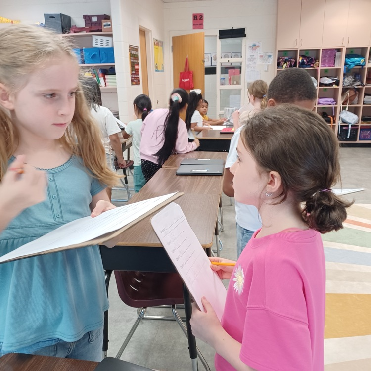 Ms.C's third graders are busy collecting data so they can create their own bar graphs and pictographs.  