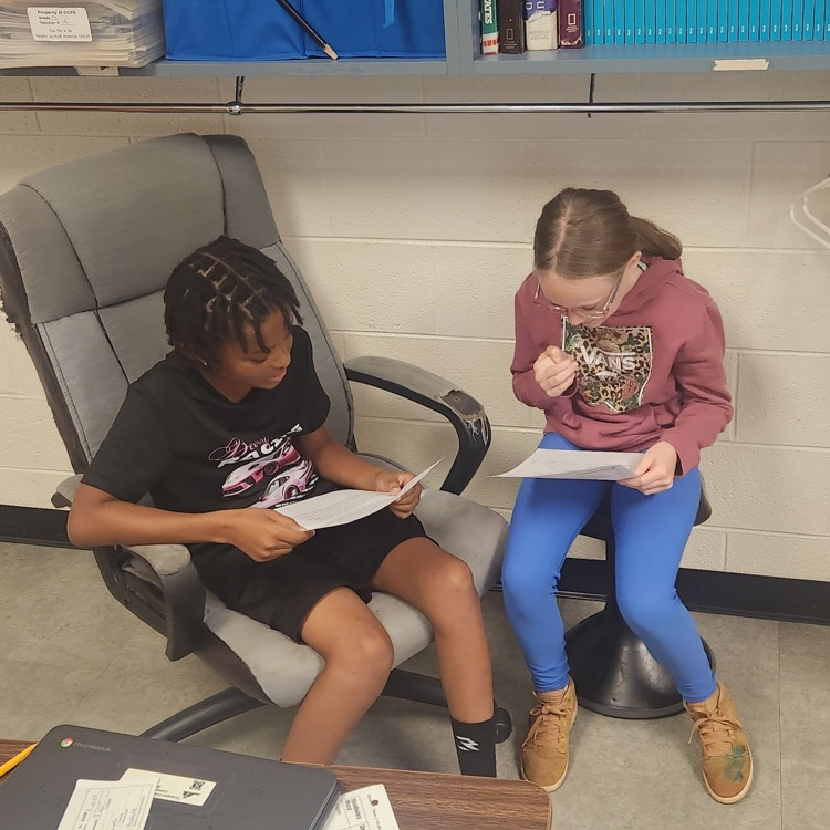 Mr. Hallett's 5th graders on Day 4 of paired readings, starting to get the hang of it!