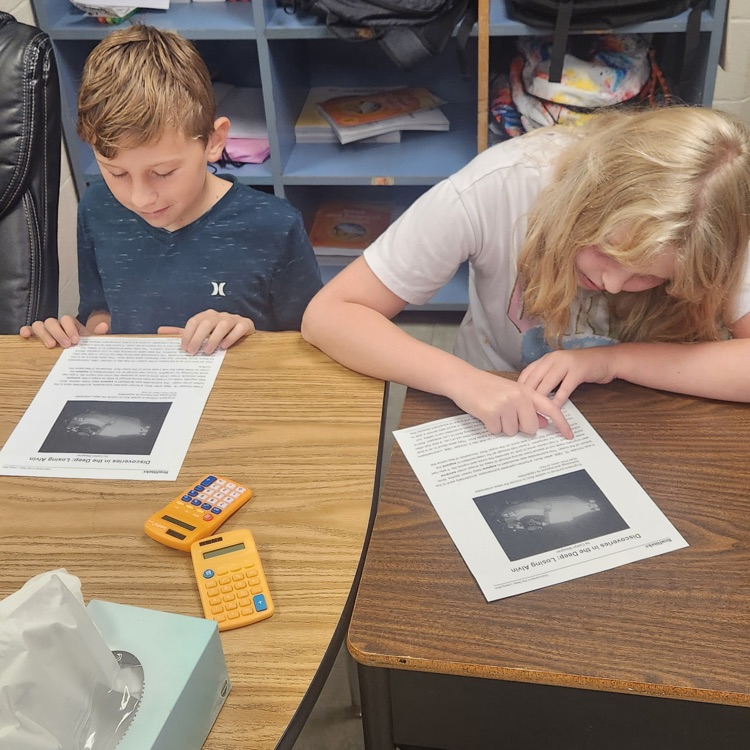 Mr. Hallett's 5th graders on Day 4 of paired readings, starting to get the hang of it!