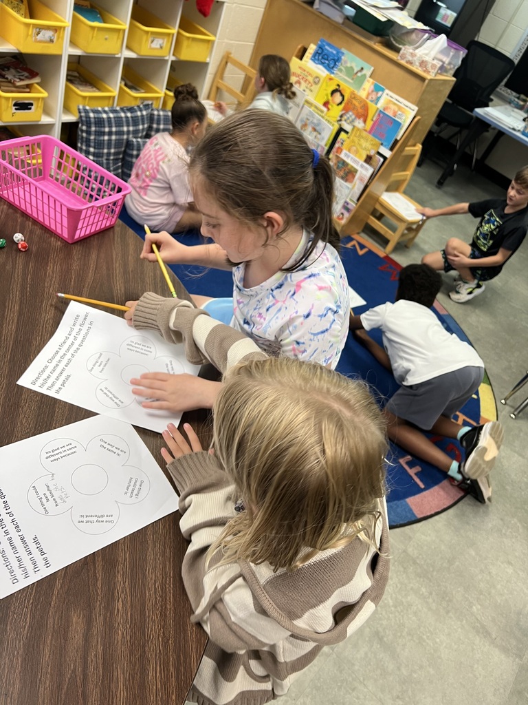 In Social Studies, AGR 3rd Graders in Mrs. McFarland's class are studying diversity.  In these pictures, students chose a partner that they didn't know well.....yet. Students spent a few minutes interviewing each other and many discovered they had a lot in common!