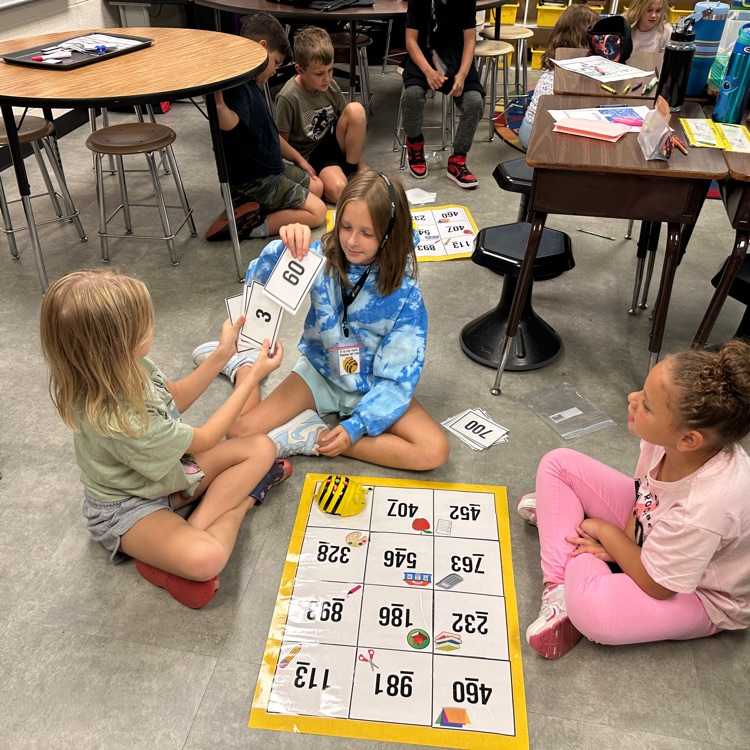 AGR 3rd graders continued working on place value and practicing with bee bots today.  Pictured here are students in Mrs. McFarland's class, who worked very well together as teams.