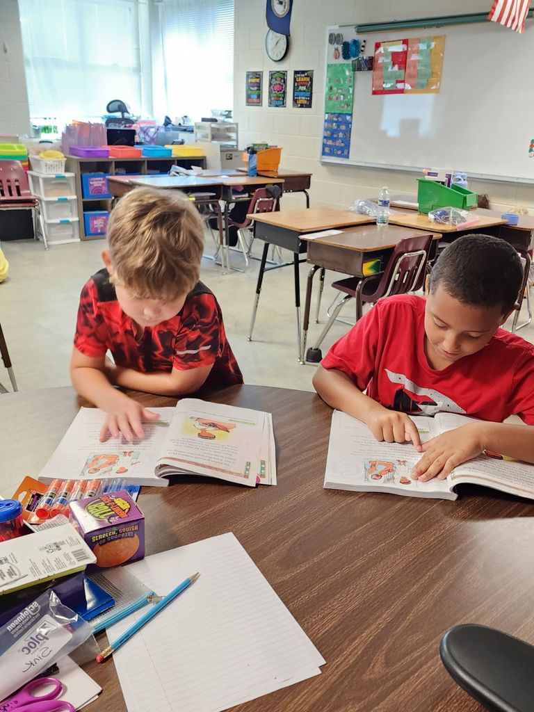 Pictured here, Mrs. Sink's 3rd Graders practiced some partner reading!