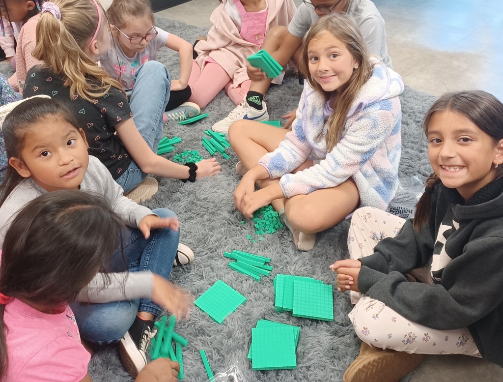 Ms. C's 3rd graders are working in teams with place value. We are place value champs and we can represent numbers 2 different ways into the hundreds. 