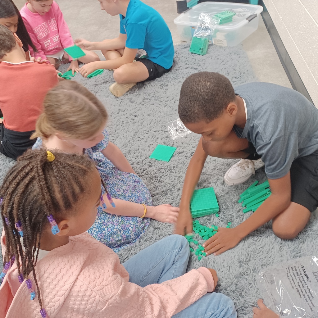 Ms. C's 3rd graders are working in teams with place value. We are place value champs and we can represent numbers 2 different ways into the hundreds. 
