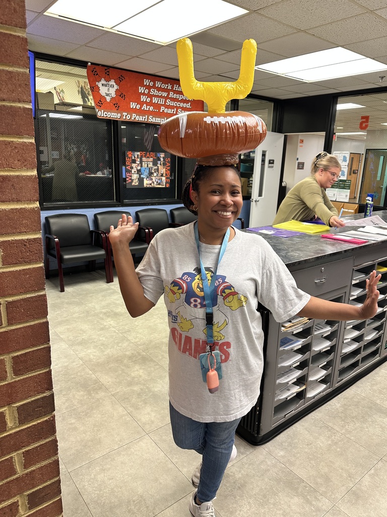 Ms. May in her football hat!