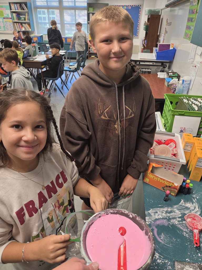Fifth grade students in Mrs. Guinn’s class conduct science activities for a matter unit. Some students are indoors mixing colorful Oobleck in bowls, smiling as they hold up their mixtures. Others are outdoors in the school courtyard holding plastic bags of homemade ice cream, wearing gloves, and posing together in groups. The photos show engaged students enjoying hands-on experiments with both messy mixtures and edible treats.