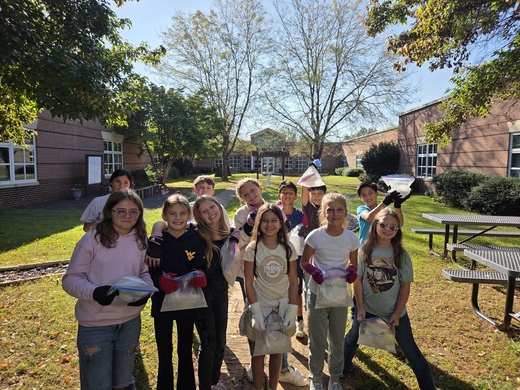 Fifth grade students in Mrs. Guinn’s class conduct science activities for a matter unit. Some students are indoors mixing colorful Oobleck in bowls, smiling as they hold up their mixtures. Others are outdoors in the school courtyard holding plastic bags of homemade ice cream, wearing gloves, and posing together in groups. The photos show engaged students enjoying hands-on experiments with both messy mixtures and edible treats.