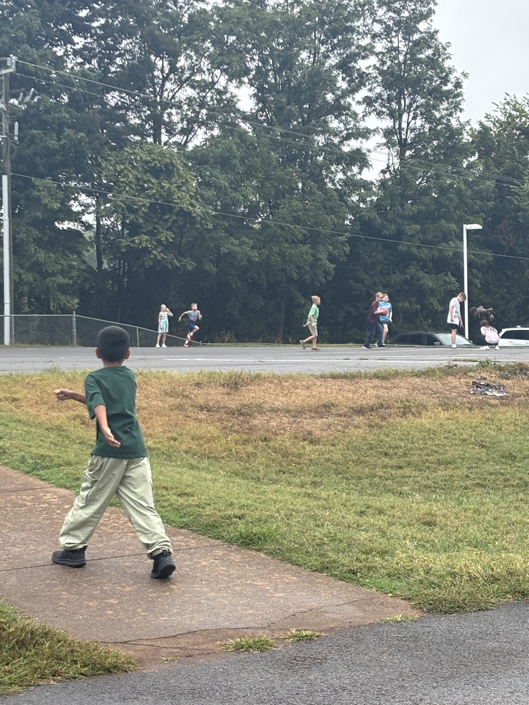Mrs. Birch's 4th Graders are pictured here enjoying a little mid-morning recess to fulfill their earned minutes from good behavior in the cafeteria this week!!