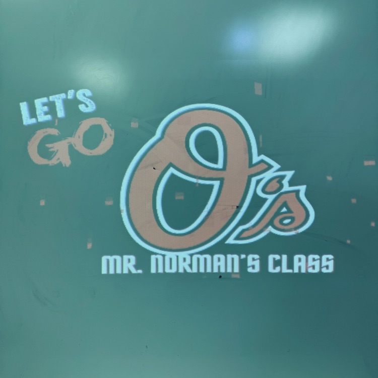 Mr Norman sign. it says let’s go O’s. Mr. Norman’s class