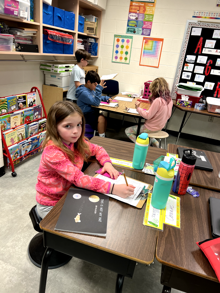 Pictured here are Mrs. McFarland's 3rd graders playing subtraction scoot to practice subtracting 3 digit numbers.  Great job!