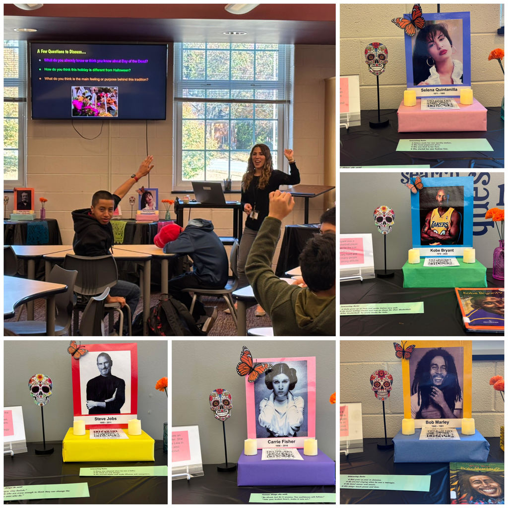 A collage of photos showing a classroom activity about Día de los Muertos (Day of the Dead). In the main image, a teacher stands at the front of the room leading a discussion with middle school students raising their hands. A presentation slide on the board reads questions about the Day of the Dead and how it differs from Halloween. Around the classroom are colorful altars (ofrendas) decorated with photos, candles, flowers, and sugar skulls. Smaller photos highlight specific ofrendas dedicated to Selena Quintanilla, Kobe Bryant, Steve Jobs, Carrie Fisher, and Bob Marley, each framed with bright paper and decorated with candles and monarch butterflies.