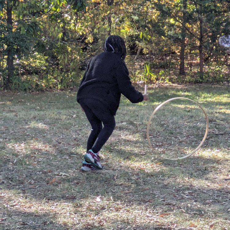 A student is playing a game that was played long ago