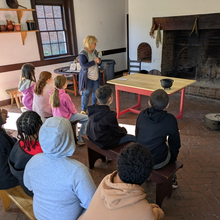 A group of students checking out an old school house