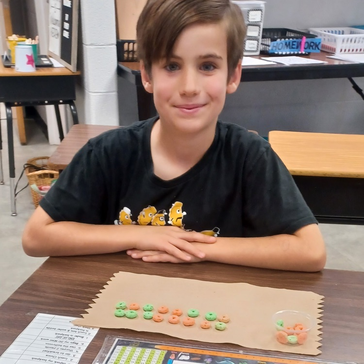 Meanwhile, down the hall in Ms. Ciccarone's third grade class, student   were using cereal to practice multiplication arrays.