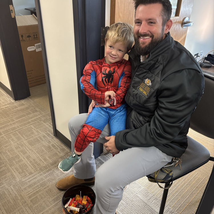 The Little Blues Pre-School trick-or-treated through the office today and Spider-Man, aka Cooper, ran into his Uncle Nick, aka Assistant Principal Zajkowski. 