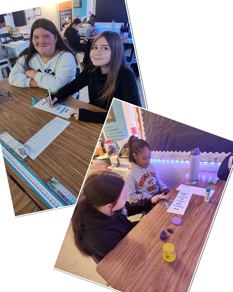 A collage of two images showing four students at desks in a classroom. In the top image, two girls smile at the camera while working on a number puzzle sheet on the desk. In the bottom image, two other girls are focused on their desks, which have the number puzzle sheet and small manipulatives, including what appears to be playdough and counters.