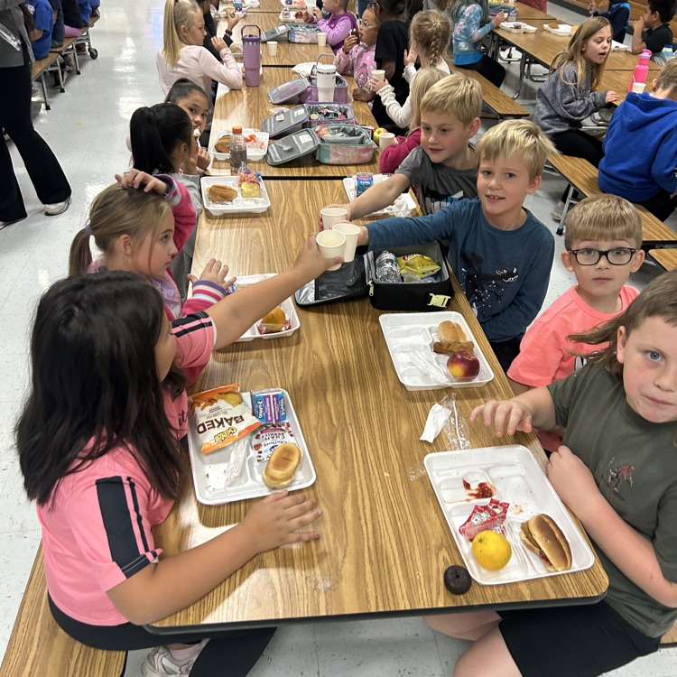 pictured here our students enjoying two different activities - donuts, insider at lunch and a glow party in the afternoon