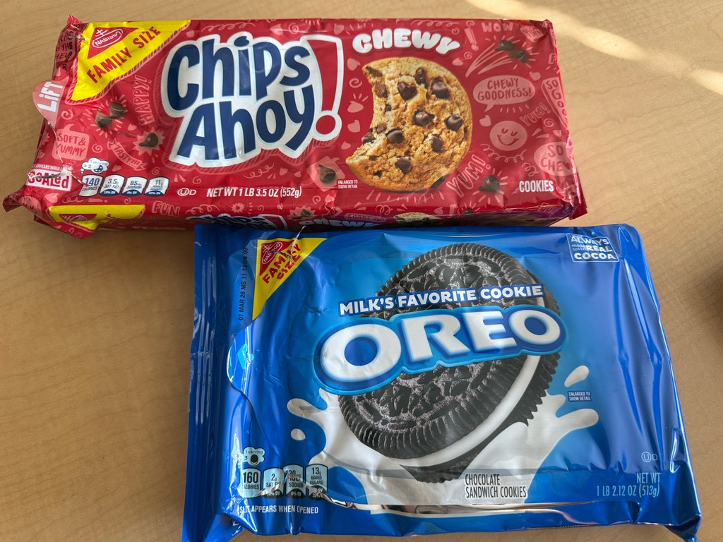 A close-up of two packages of cookies—Chewy Chips Ahoy and Oreo—used as part of the classroom voting choices for a fun mock election.