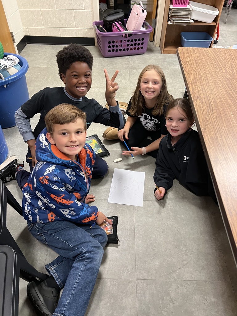 This week, Mrs. McFarland's 3rd Graders read the book "Divide and Ride" and learned about how carnival ride operators use division to know how many people can ride each ride. Students worked in small groups to create their own carnival ride, and wrote the math fact to show what they understood about division!