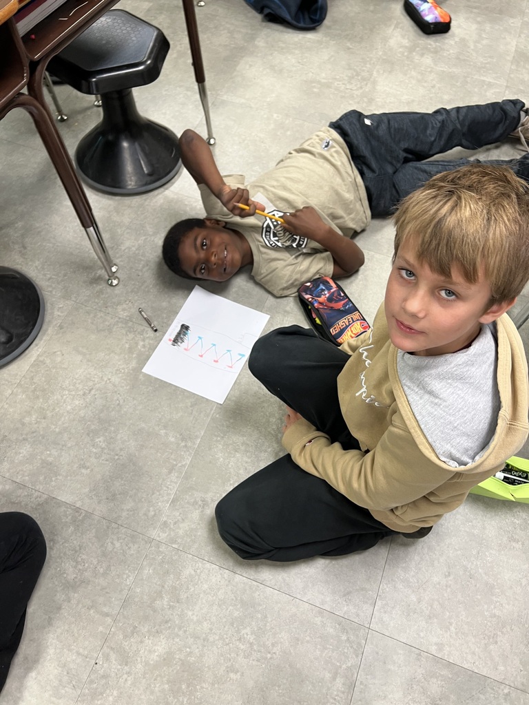 This week, Mrs. McFarland's 3rd Graders read the book "Divide and Ride" and learned about how carnival ride operators use division to know how many people can ride each ride. Students worked in small groups to create their own carnival ride, and wrote the math fact to show what they understood about division!