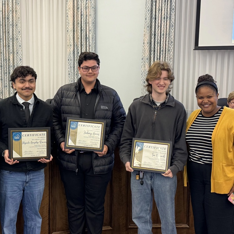 3 boys holding awards for VA Music Educators Assoc.. Senior Honor Choir
