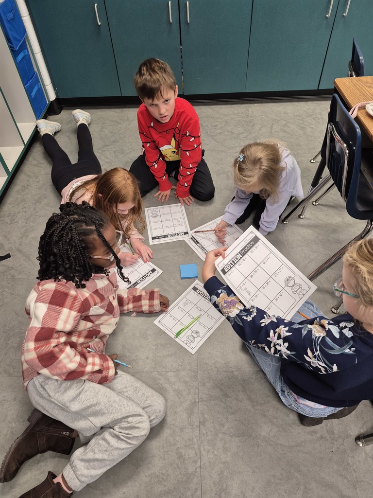 Students working together to solve math problems