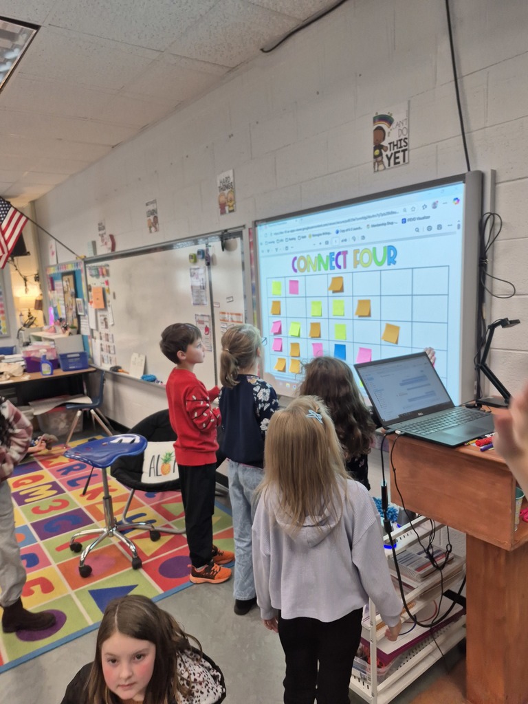 Students working together to solve math problems