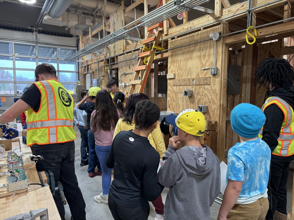 Getting a tour of the electrical shop