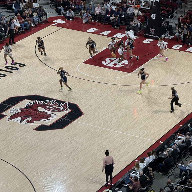 CCHS class of 2025, Kelley Hutcherson (number 9) is playing against #2 ranked University of South Carolina. Kelley is living her dream of playing division 1 basketball and studying sports management at Queen College. 
