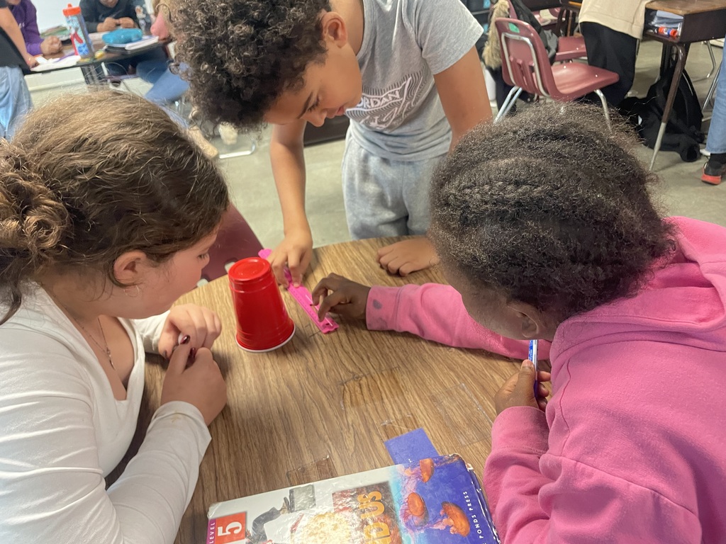 Students in Ms. Sheads' class are testing three different masses with force and motion. They are measuring the distance a cup traveled after rolling different sized balls into the cup! Everyone hypothesized correctly that the ball with more mass would push the cup furthest. Meanwhile, students in Mrs. Day's class also worked with the same concepts, except with ramps and cars. Such great teaching and learning happens everyday at AGR!