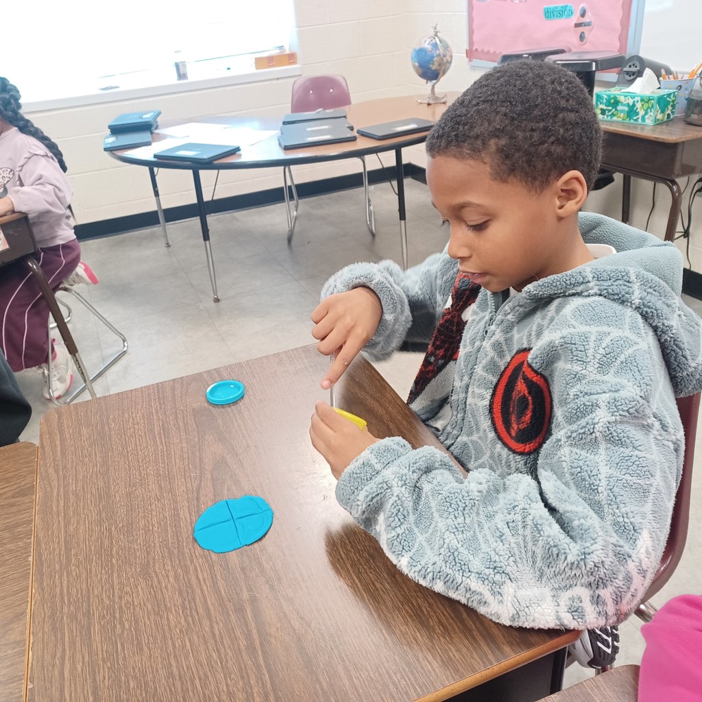 Ms.C's 3rd class came back from their winter break ready to learn. We are having fun with fractions today in math class.