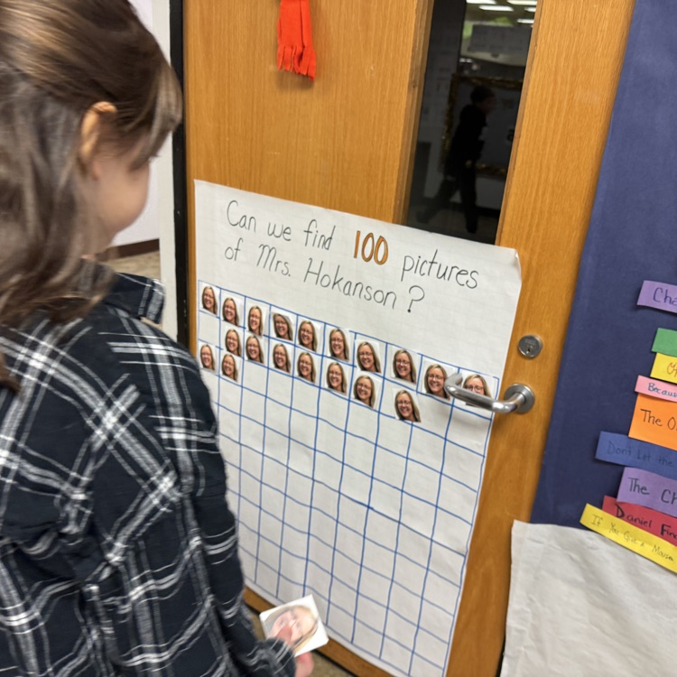 girl, putting a picture of Mrs. Hokanson on the hundred chart