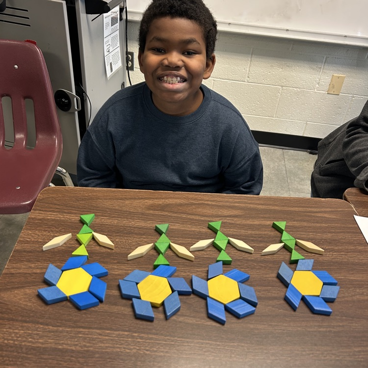 Meanwhile, 5th graders in Mr. Hallett’s class worked to create a pattern block design with a value of $100 in honor of the 100th day of school!
