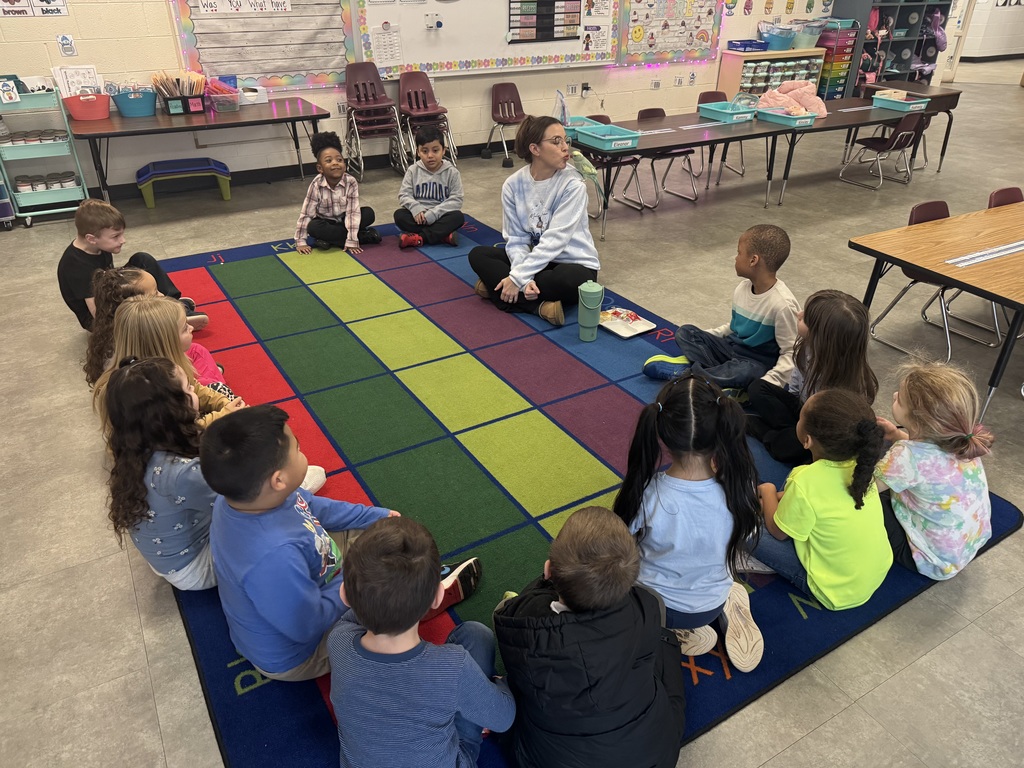 Pictured here is Kammy’s mom, Miss Sarah, brought in Ziggy, an Indian Ringneck parrot, for our letter Z show-and-tell.